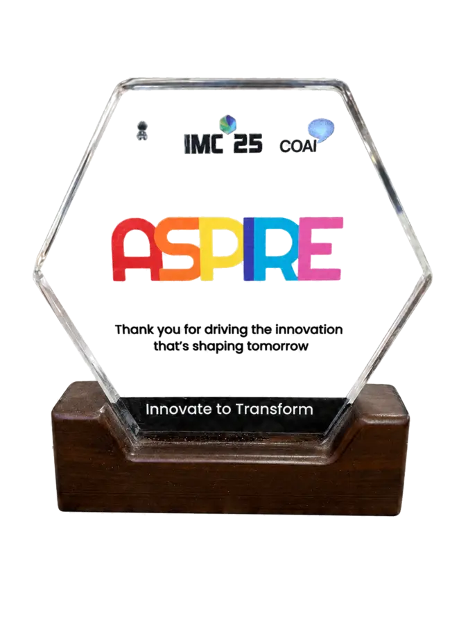 IMC 2025 COAI ASPIRE recognition trophy with Innovate to Transform inscription